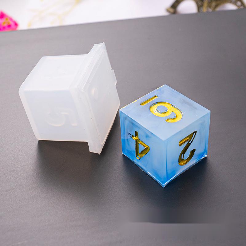 Cube dice mold.